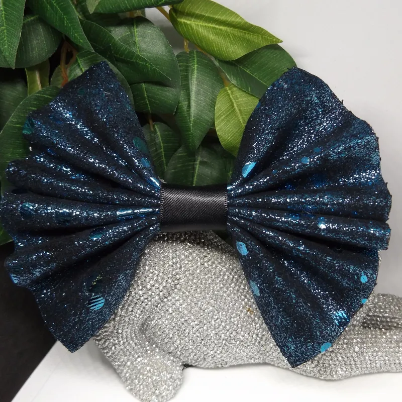 Handmade hair bows in various colours and patterns
