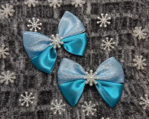 Beautiful bespoke bow collection by Letzgetcrafty